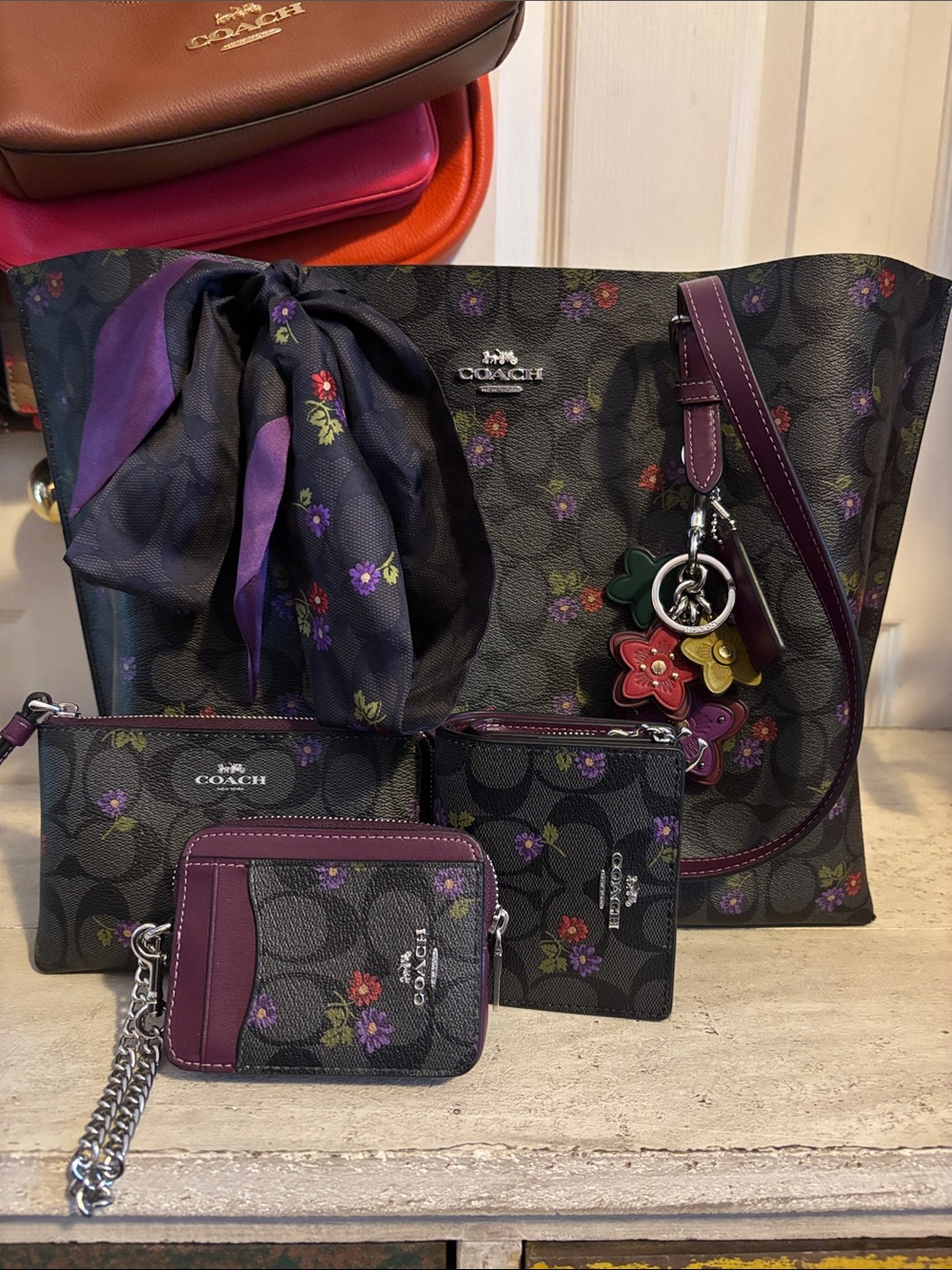 Coach Black Floral Signature Tote with Purple Accents and Charms